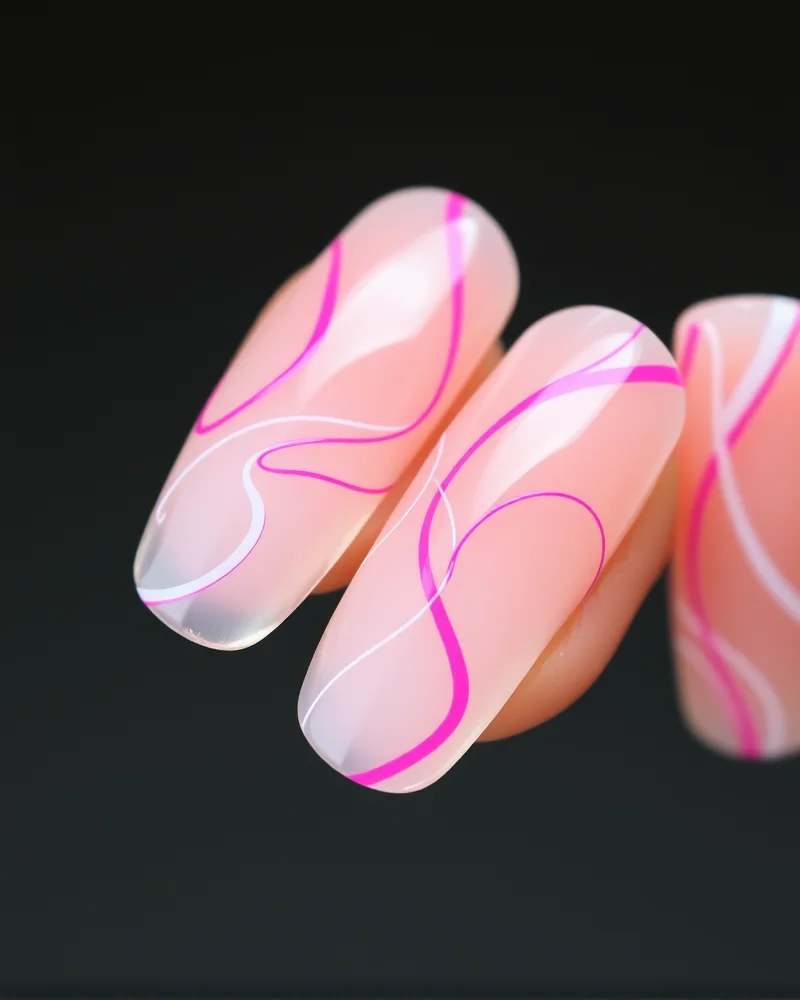 Short oval nails with artistic, flowing neon pink and white swirls over a natural clear base, highlighting the negative space trend.