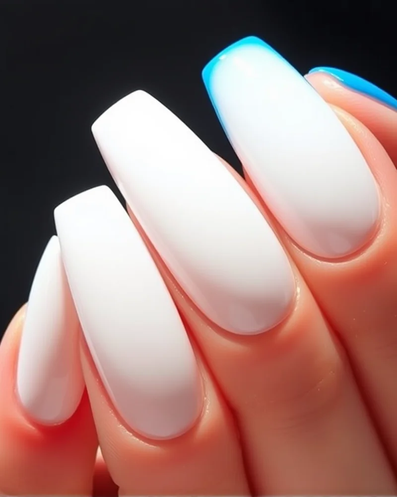 7 Viral Bomb Pop 4th Nails: The Ultimate Retro-Cool Manicure Trend 2 Coffin nails showcasing a vertical red-white-blue gradient finish that mimics a classic popsicle.