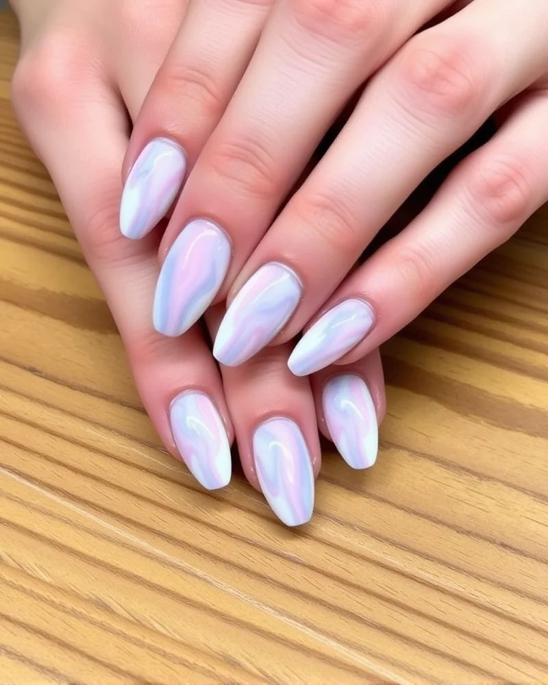 Pastel marble effect on almond shaped summer nails 2026.