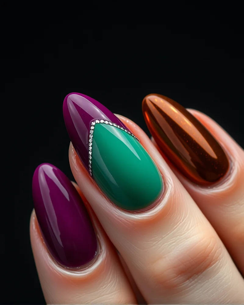 A set of fashionable fall funky nails featuring the New Autumn color palette including Electric Plum and Neon Moss with metallic chrome accents.